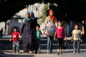 Palestinians flee their homes
