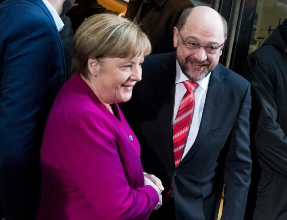 Angela Merkel e Martin Schulz insieme per formare il nuovo governo della Grosse Koalition