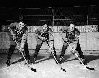 Members of the Canadian Ice Hockey Team: Ab Renaud, Ted Hibberd, and Reg Schroeter.