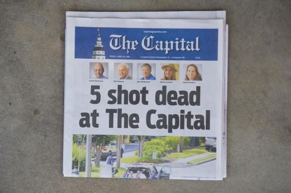 La prima pagina del giornale che è stato attaccato ieri: si cono le cinque foto delle persone uccise