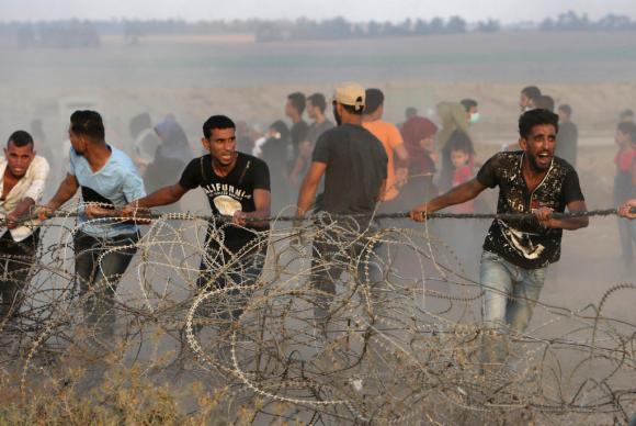 Venerdì 20 luglio: miliziani di Hamas alla frontiera con Israele