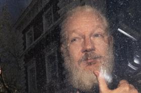 Julian Assange lors de son arrestation à Londres