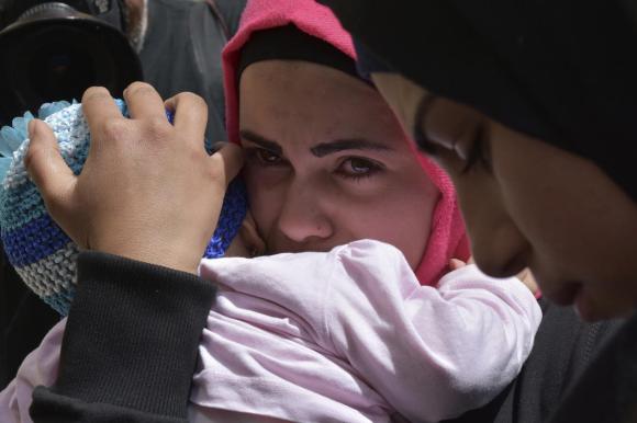 Réfugiée syrienne avec son bébé