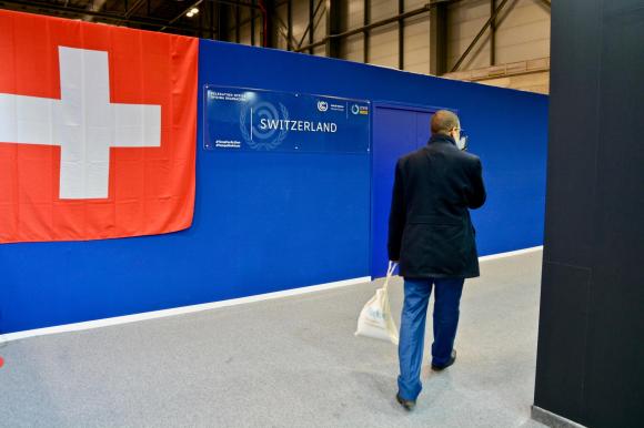 Swiss flag and temporary-looking structure