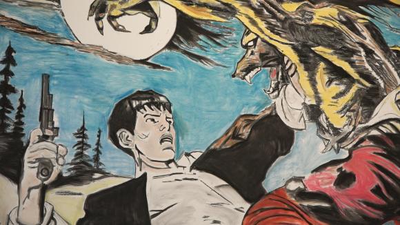 Un particolare del murale con protagonista Dylan Dog aggredito da un lupo mannaro.