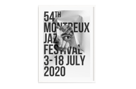 Poster che raffigura un uomo che si affaccia da uno squarcio che ha praticato in un poster; scritte nome del festival e date
