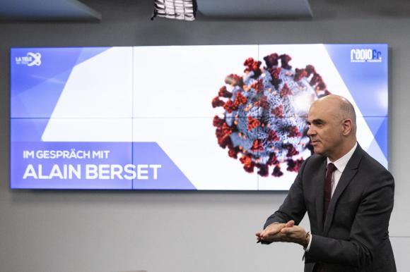 Interior minister Alain Berset ahead of a radio interview