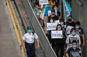 dimostranti a hong kong