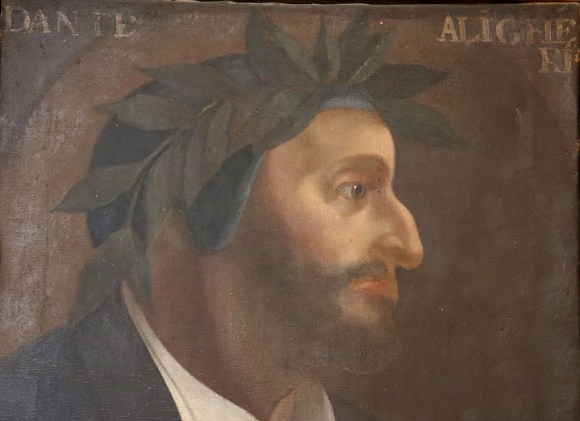 Dante visto di un profilo in un dipinto che lo raffigura con barba e corona di alloro