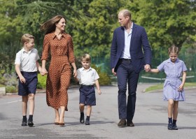 William con la moglie e i tre figli.